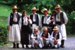 A Romanian family dressed in traditional clothing. Photo credit: Peter Guttman