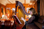 Entertainment in the dining car on the Golden Eagle Danube Express