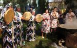 Songs and dances help pass the time for those preparing sumalak for the Navruz holiday celebration. Photo credit: Islom Nizomov
