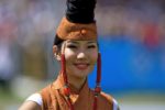 Friendly smiles at the Naadam Festival. Photo credit: Helge Pedersen