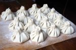 Delicious khinkali dumplings, ready to be cooked and eaten.