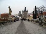 Crossing the Charles Bridge across the Vltava River.