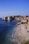 An Adriatic beach and Dubrovnik's walls.
