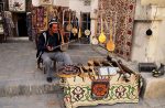 A Bukhara merchant sells traditional musical instruments. Photo credit: Michel Behar