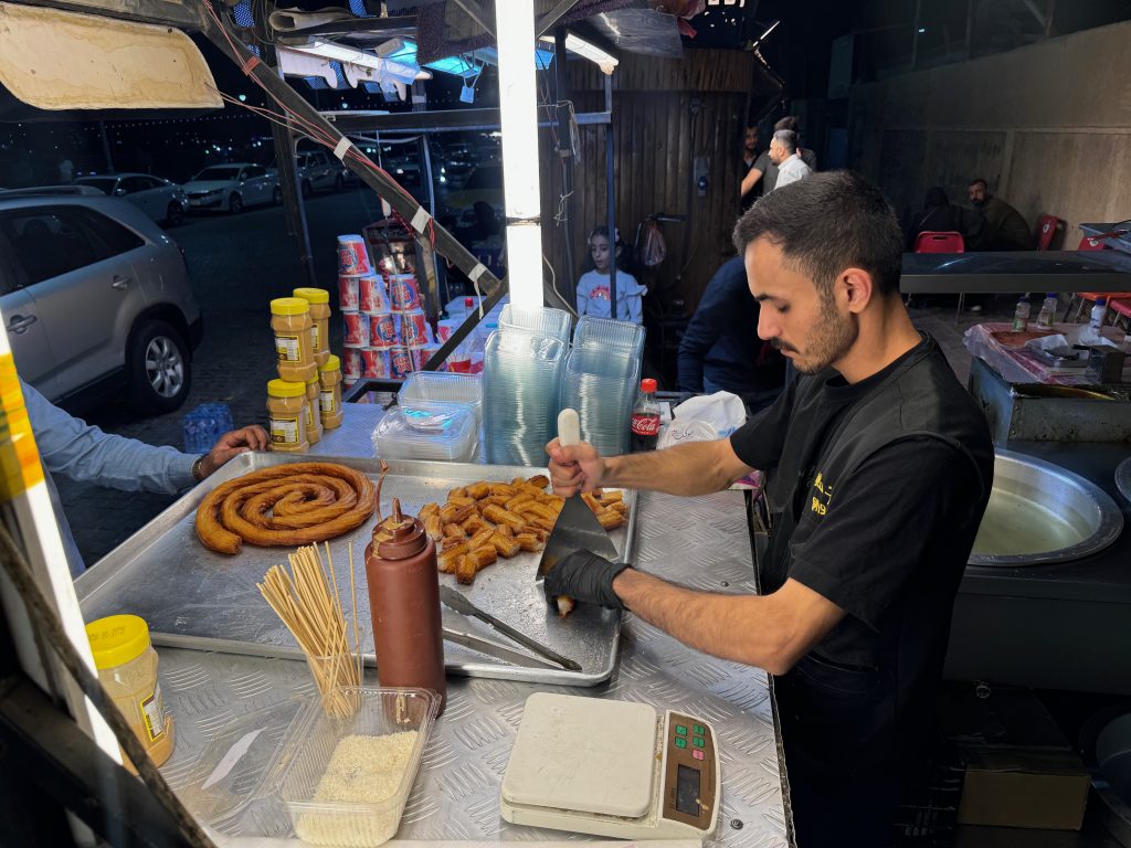 A vendor Making Datli Returning to Iraq with MIR