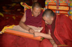 Monks reading scriptures. Photo credit: Russ Cmolik & Ellen Cmolik