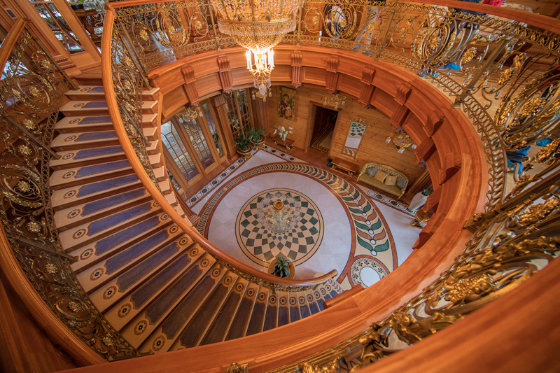 The wood paneling alone on the mansion staircases cost around $200,000 USD. Photo credit: Gary Krosin