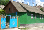 Moldovan village home – note the satellite dish on the tin roof. Photo credit: Joanna Millick