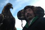 A berkutchi and his bird at the Golden Eagle Festival. Photo credit: Nomadic Expeditions