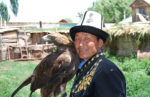 A Kyrgyz eagle hunter and his friend. Photo credit: Douglas Grimes
