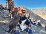 An eagle hunter and his companion prepare to compete at Mongolia's Golden Eagle Festival. Photo: Michel Behar