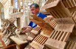 Master of woodcarving at work in Khiva, Uzbekistan. Photo credit: Michel Behar