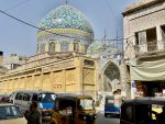 The Haydar-Khana Mosque on a busy street in Baghdad. Photo credit: Michel Behar