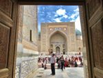 Admiring the incredible Timurid tile work at the Registan in Samarkand. Photo credit: Michel Behar