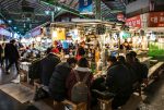 Grabbing a bite at the Gwangjang Market in Seoul. Photo credit: ©Korea Tourism Organization Photo Korea IR Studio