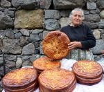 A bread vendor in Geghard, Armenia. Photo credit: Devin Connolly