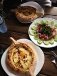 Boat-shaped Adjaran khachapuri with a cargo of eggs, cheese and butter. Photo credit: Mariana Noble