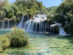 Admiring the waterfalls at UNESCO-listed Plitvice Lakes National Park in Croatia. Photo credit: Gerald Smetana