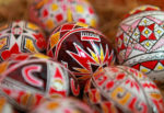 Designs on Romanian wooden and real hollowed-out eggs were once secret languages of local residents. Photo credit: John Baker