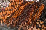 Wooden cross necklaces for sale at a market. Photo credit: Richard Fejfar