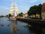 Sailboats, dinghies, and kayaks fill Klaipeda's Dane River. Photo credit: Lithuanian State Department of Tourism