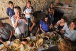 Sampling rich food and wine at a Georgian Table feast. Photo credit: Kees Sprengers
