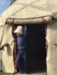 Embracing the morning after a night in a Kyrgyz yurt.