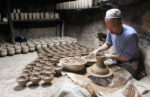 Earthenware craftsman in Kashgar, China. Photo credit: Willis Hughes