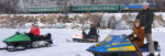 Snowmobiles and the Golden Eagle train. Photo credit: Vladimir Kvashnin