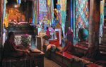 Tibetan monks recite sutras inside Samye Monastery. Photo credit: Martin Klimenta