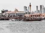 Dhows in the harbor in front of the Grand Mosque of Kuwait. Photo credit: Tayssir Kadamany/Pexels