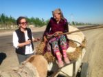 Patricia Schultz chatting with a local in Uzbekistan. Photo credit: Michel Behar