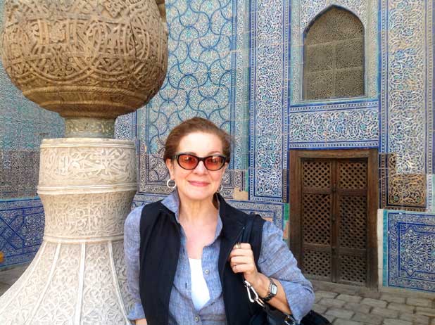 Patricia in her favorite spot on the trip to Central Asia – Khiva, Uzbekistan. Photo credit: Michel Behar