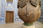 Tile-worked walls and carved pillars are everywhere in Khiva, Uzbekistan. Photo credit: Michel Behar