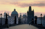 Charles Bridge at dusk in Prague, Czech Republic. Photo credit: Danube Express