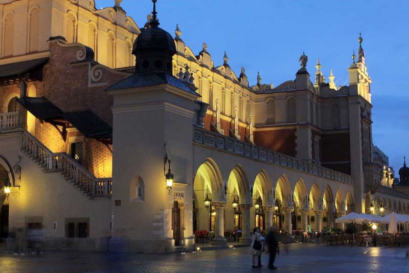 The Renaissance Cloth Hall glows in Rynek Glowny, Krakow. Photo credit: Polish National Tourist Board