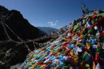 A mountain of Tibetan prayer flags. Photo credit: Phil Kidd