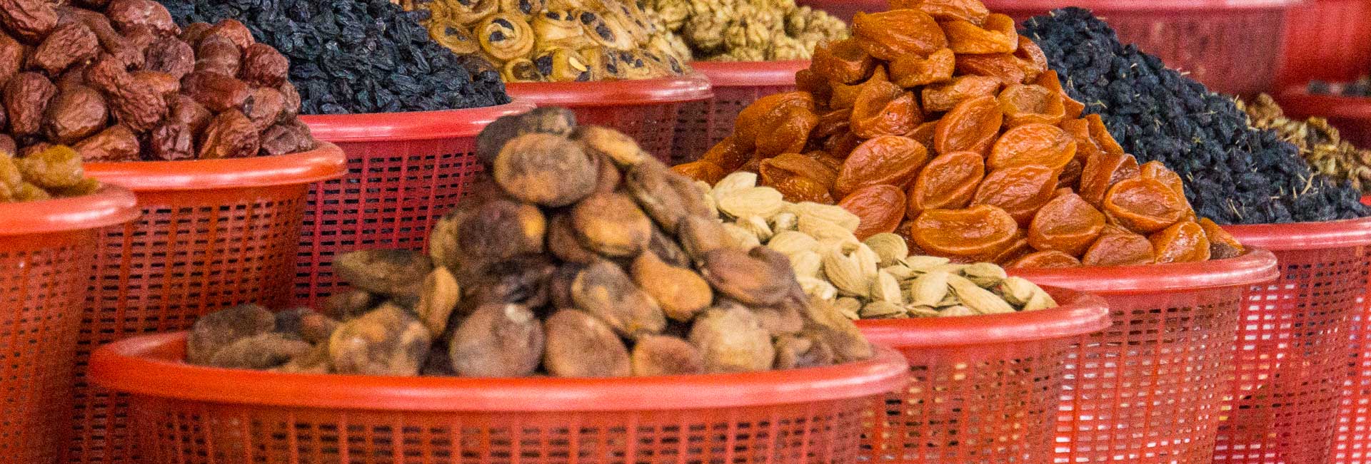 Dried fruit and nuts at a market in Samarkand. Photo credit: Andra Artemova